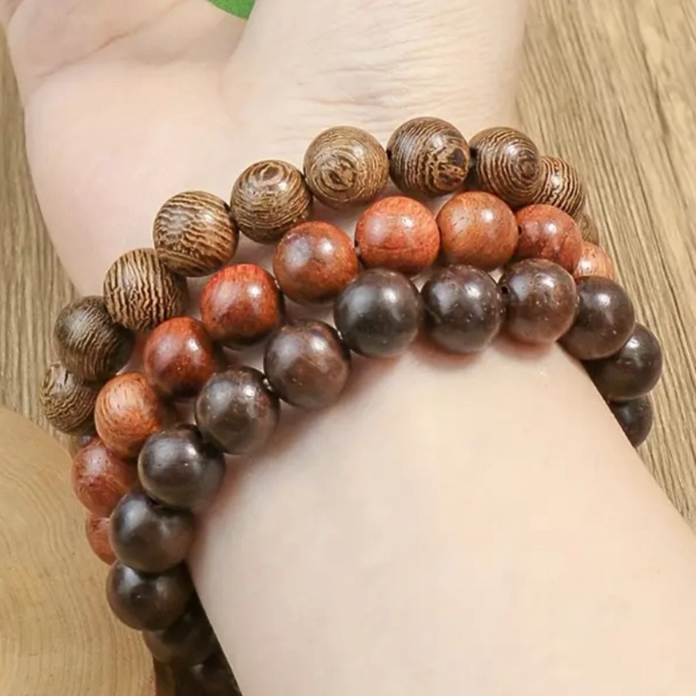 Tribal-Style Wooden Bead Bracelet Showcasing Multicolor Natural Wood Wristbands.